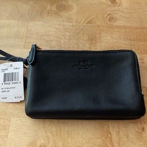 Brand New black Coach wallet with tags .